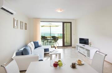Exclusive One-Bedroom Apartment with Terrace and Sea View в  Calithea Complex